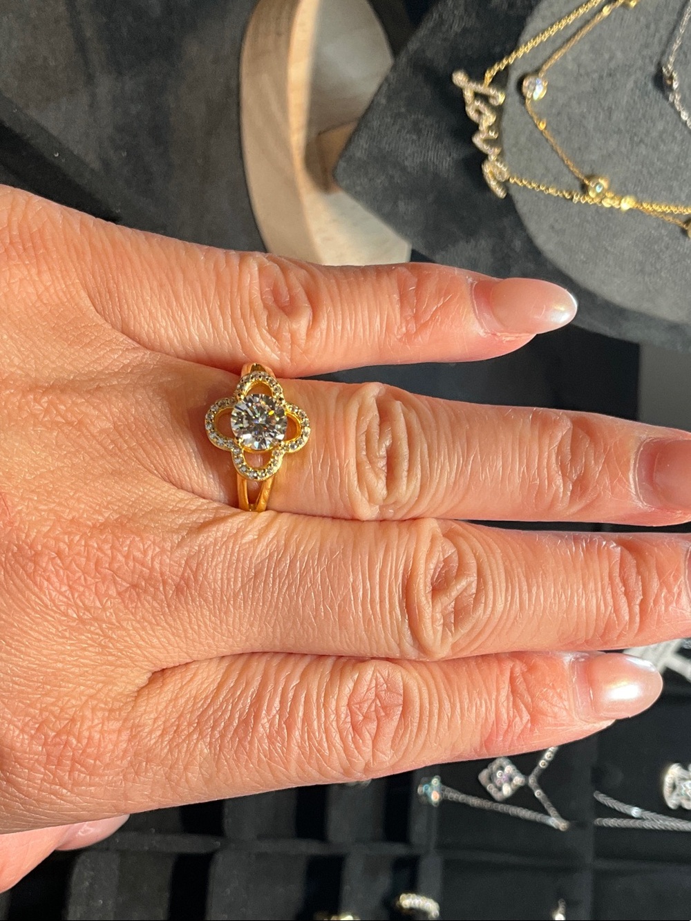 Gold Floral Halo Solitaire Ring with Clear Center Stone